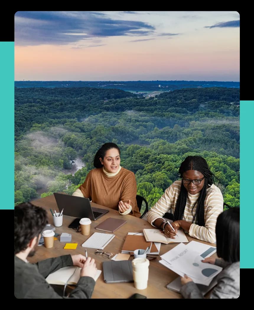 A group gathered around a table in conversation on communications strategies